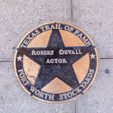 texas trail of fame honors Robert Duval with a plate at wolk of fame in Fort Worth Stockyards