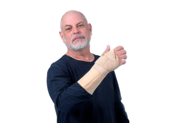 adult man wearing hand guard and wrist tendinitis injured arm looking forward business man and fashion expression "SeniorLife"