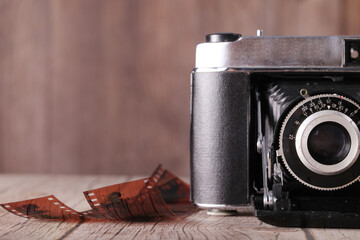 Antique film folding camera and old film
