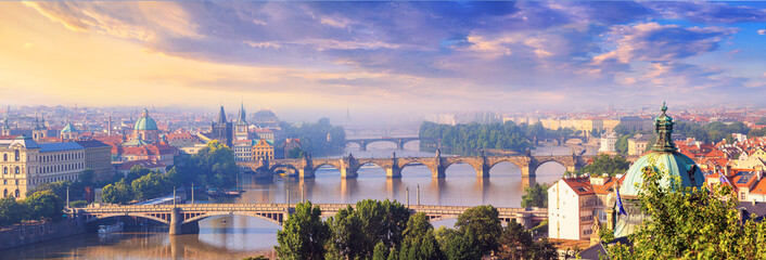 City summer landscape, panorama, banner - top view of the historical center of Prague and the Vltava river with bridges, Czech Republic