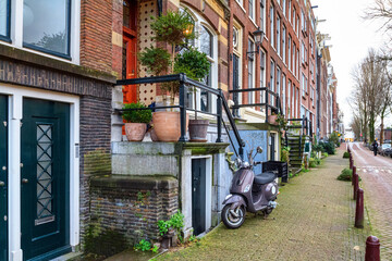 Cityscape - view of the facades of buildings in the old district of the city of Amsterdam, the...