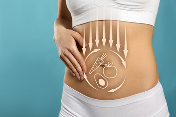 Healthy digestion. Woman touching her belly against light blue background, closeup. Illustration of...
