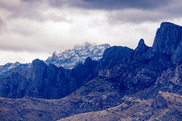 The misty Catalina mountains dusted with freshly fallen snow. Tucson, AZ.