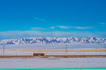 Highways, Snowy Mountains, and Winter Snow Scenery in Xinjiang Uygur Autonomous Region, China