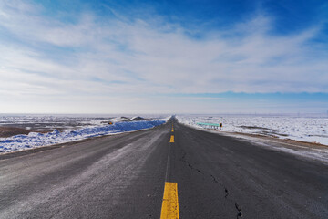 Highways, Snowy Mountains, and Winter Snow Scenery in Xinjiang Uygur Autonomous Region, China
