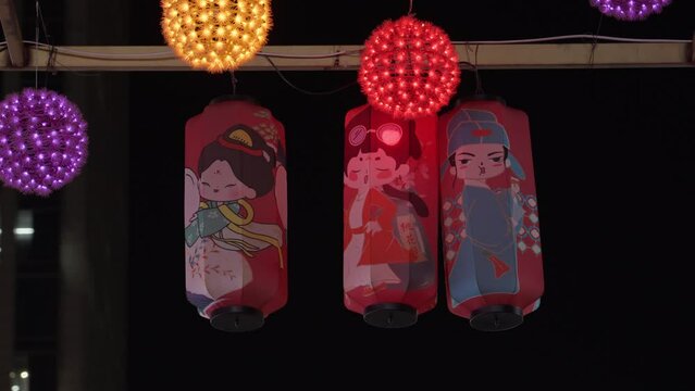 Lanterns decorated with ancient Chinese cartoon characters