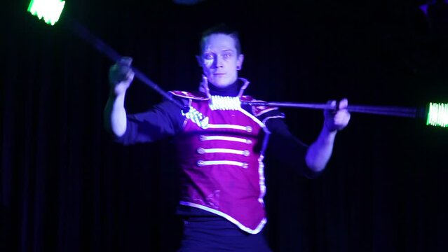 Performance of handsome man with terrible pupils in samurai garb