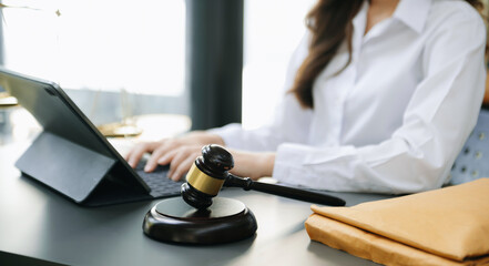 justice and law concept.law the desk, books, balance. Female judge in a courtroom the gavel,working...