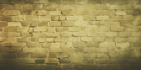 A toned khaki-colored brick wall background, beautifully enhanced by the interplay of light and shadows
