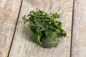 Green Arugula heap over background