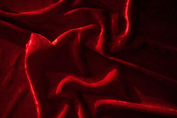 Abstract background made of red velvet fabric.