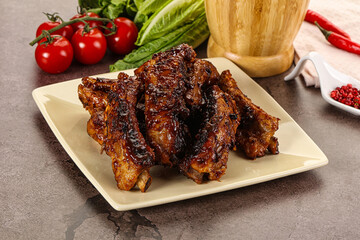 Grilled pork ribs in barbecue sauce
