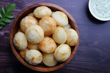 Paniyaram are savory balls made using fermented rice and urad dal batter along with tempered onion...