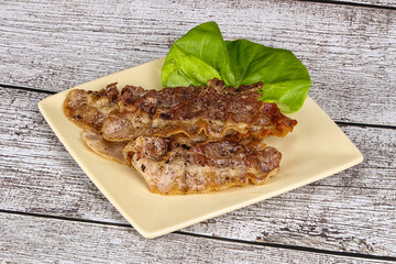 Roasted sliced pork fat bacon