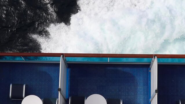 big waves hitting the side of a cruise ship