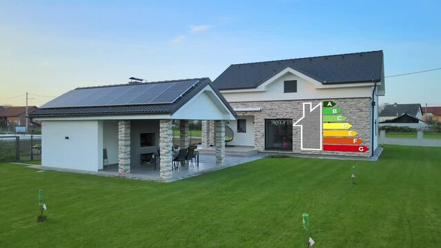 Smart Home With Animation Of Energy Efficiency Display. Minimal Energy Consumption With Optimal Power Usage. zoom-in, digital effects