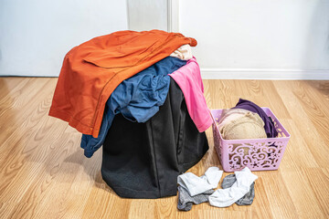 Clothes, socks, underwear prepared for washing.