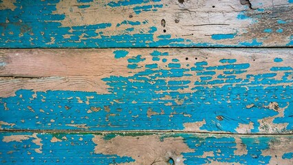 Fototapeta na wymiar Old wood texture background. Floor surface with peeling blue paint.