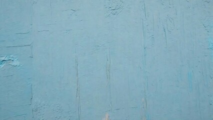 Old blue paint on the wall. Abstract background and texture for design.