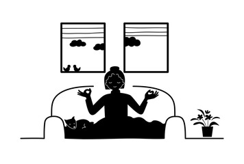 Silhouette of a happy introvert woman doing meditation on a couch at home with a dog.