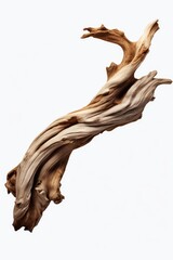 Fototapeta premium A large piece of drift wood placed on a white background. Perfect for rustic and natural-themed designs