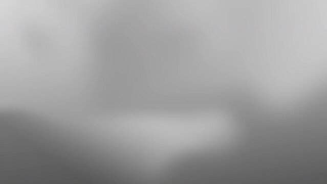 Grey gradient background. Seamless looping animation. 4K footage