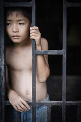 Obraz premium The concept of poor children victims of human trafficking process, poverty, child abuse. child labor concept, victims of human trafficking process, poverty, child abuse, violence against children.