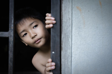 The child captured the iron cage with sadness and despair. The concept of stopping violence against...