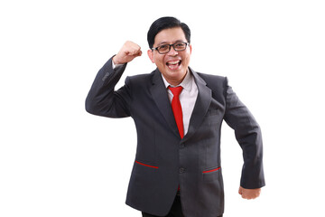 Excited asian businessman celebrating his success with clenched hand. Isolated on white