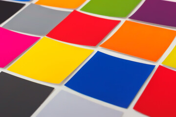 The printed paper color swatches. Color combination process with samples.