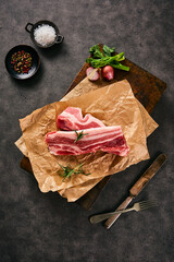 Pork belly on a thick and appetizing cutting board