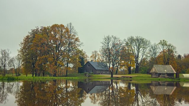 Cozy lake side home in all four seasons, time lapse view