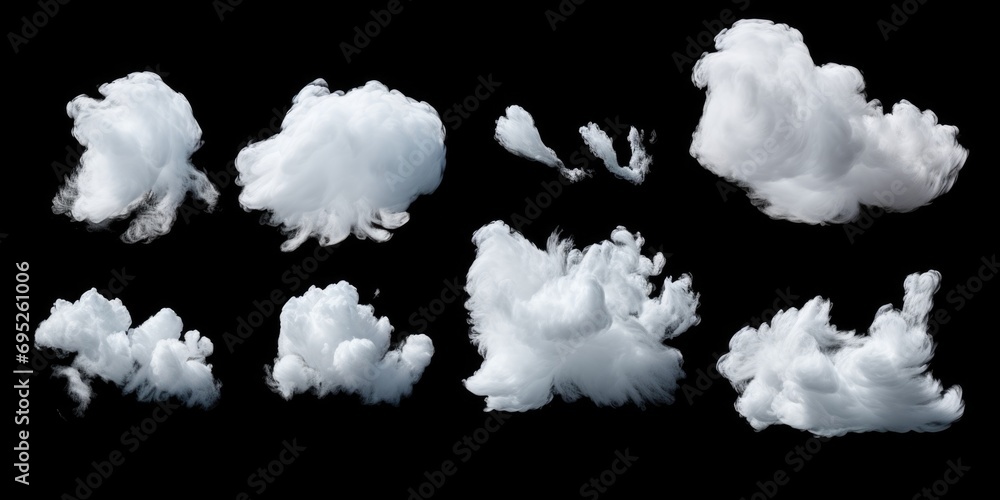 Aufkleber White clouds floating against a black background. Perfect for adding a dramatic touch to any project