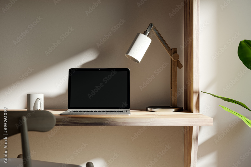 Poster modern blurry daytime table with sunlight and blank white laptop screen, lamp and coffee cup. design