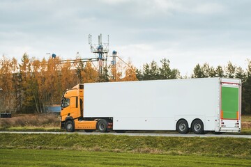 Driving a sustainable cargo truck with enhanced aerodynamics and additional load capacity on a...