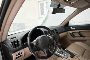 A Car Interior View of a Frozen and Snowy Windshield in a Winter Weather. Winter Driving Tips: How...