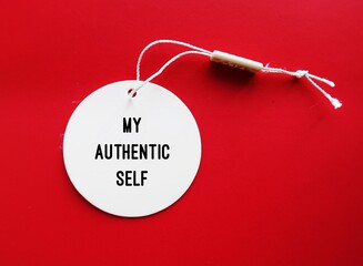 Price tag on red background written My Authentic Self - means AUTHENCITY who you really are deep...