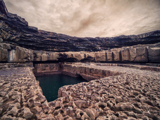 View on famous Poll na bPéist - The Wormhole, Inishmore, Aran islands, county Galway, Ireland....