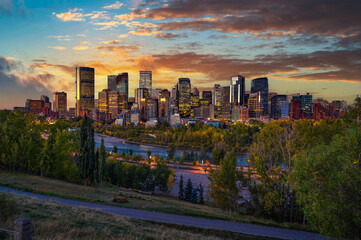 Sunset above city skyline of Calgary with Bow River, Alberta, Canada.