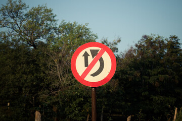 Traffic rule board in the country side don't over take