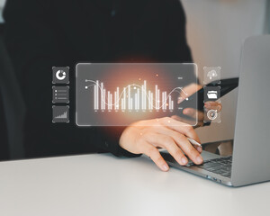 Businessman or Analyst working with Business Analytics and Data Management System on virtual screen, make a report with KPI and metrics. Corporate strategy for finance, operations, sales, marketing.