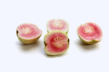 Fresh pink guava on white background.