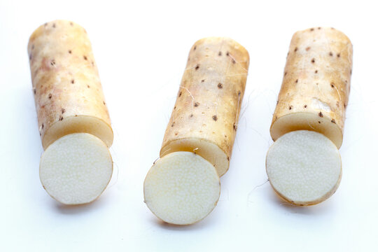 Fresh nagaimo on white background.