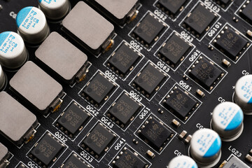 Electronic components and video card microchips. Close-up of an electronic board with SMD...