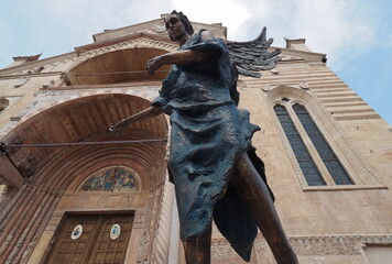 Bronze statue in front of Verona dome, Veneto, Italy