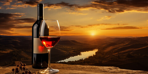 Bottle And Wine Glasses On Barrel In Vineyard At Sunset .Wine Glasses and Bottle Set Against a Sunset Vineyard Sky .