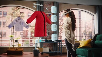 Black Woman Using Virtual Reality Headset for Online Shopping, Browsing through Stylish Seasonal Sports items. Ordering from Mock-up Internet Store App for e-Commerce products. Augmented Reality