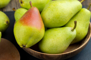fresh harvest of pears on the table in the kitchen