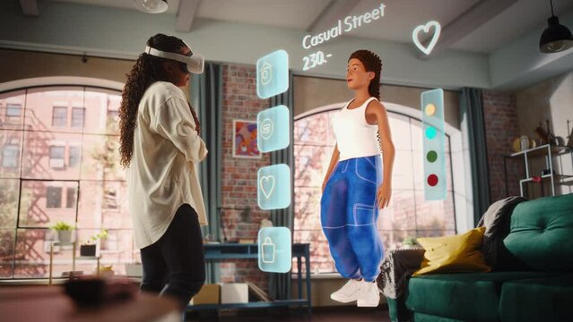 Black Woman Using Virtual Augmented Reality Headset for Online Shopping with 3D Avatar, Browsing Stylish Clothing items. Ordering from Mock-up Internet App from Online Store. Handheld Action Camera