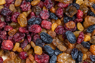 different types of dried berries on the kitchen table
